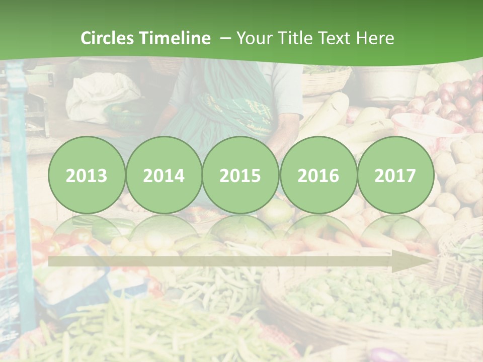 A Woman Sitting In Front Of A Display Of Vegetables PowerPoint Template