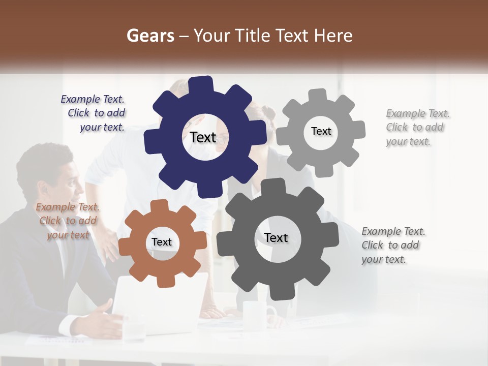 A Group Of People Sitting Around A Table With A Laptop PowerPoint Template