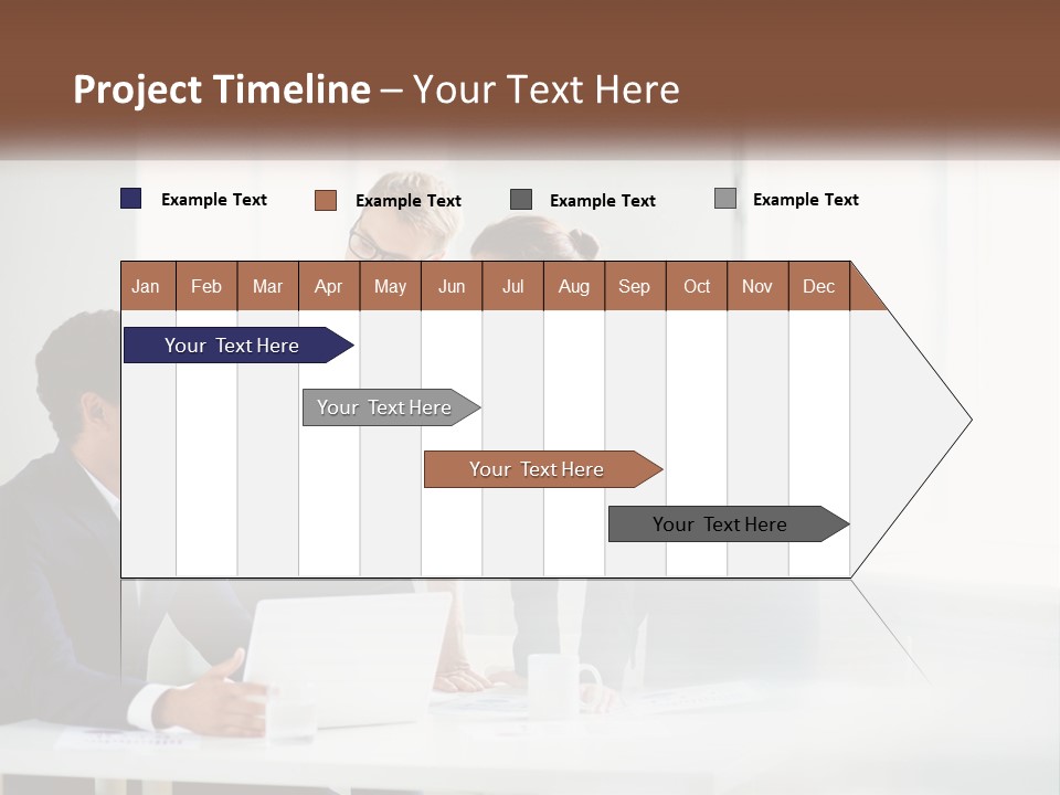 A Group Of People Sitting Around A Table With A Laptop PowerPoint Template