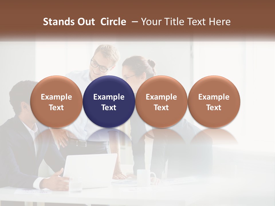 A Group Of People Sitting Around A Table With A Laptop PowerPoint Template