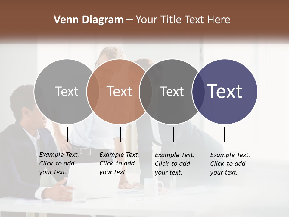 A Group Of People Sitting Around A Table With A Laptop PowerPoint Template