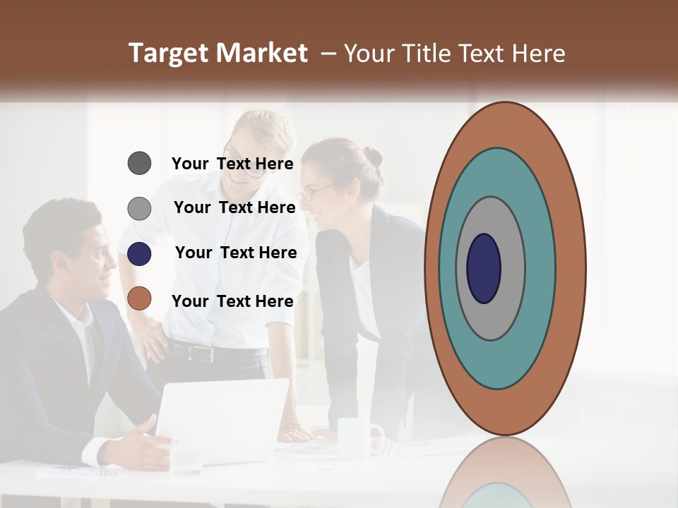 A Group Of People Sitting Around A Table With A Laptop PowerPoint Template