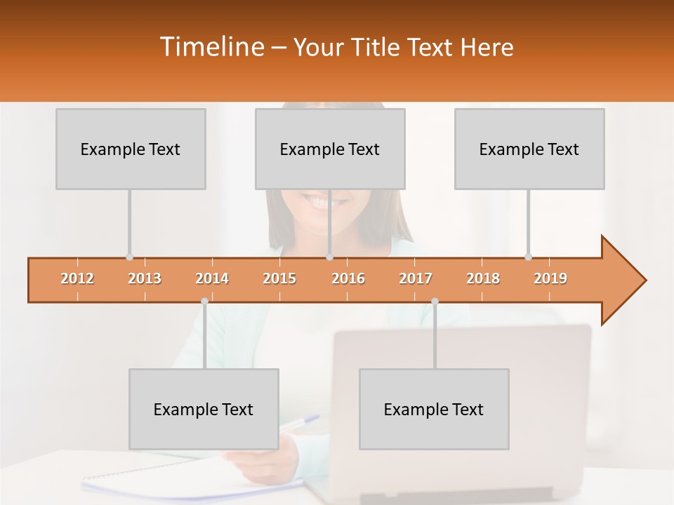 A Woman Sitting In Front Of A Laptop Computer PowerPoint Template