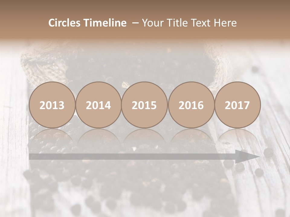 A Sack Of Black Pepper On A Wooden Table PowerPoint Template