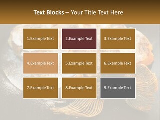 A Plate Of Pastries On A Table With Cinnamon Sticks PowerPoint Template