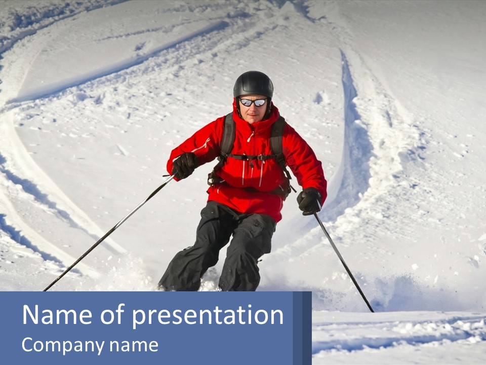 A Man Riding Skis Down A Snow Covered Slope PowerPoint Template