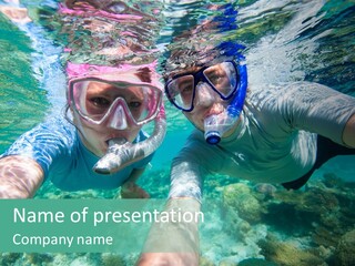 A Couple Of People That Are In The Water PowerPoint Template