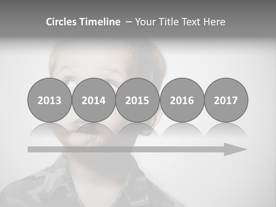A Young Boy Is Making A Funny Face PowerPoint Template