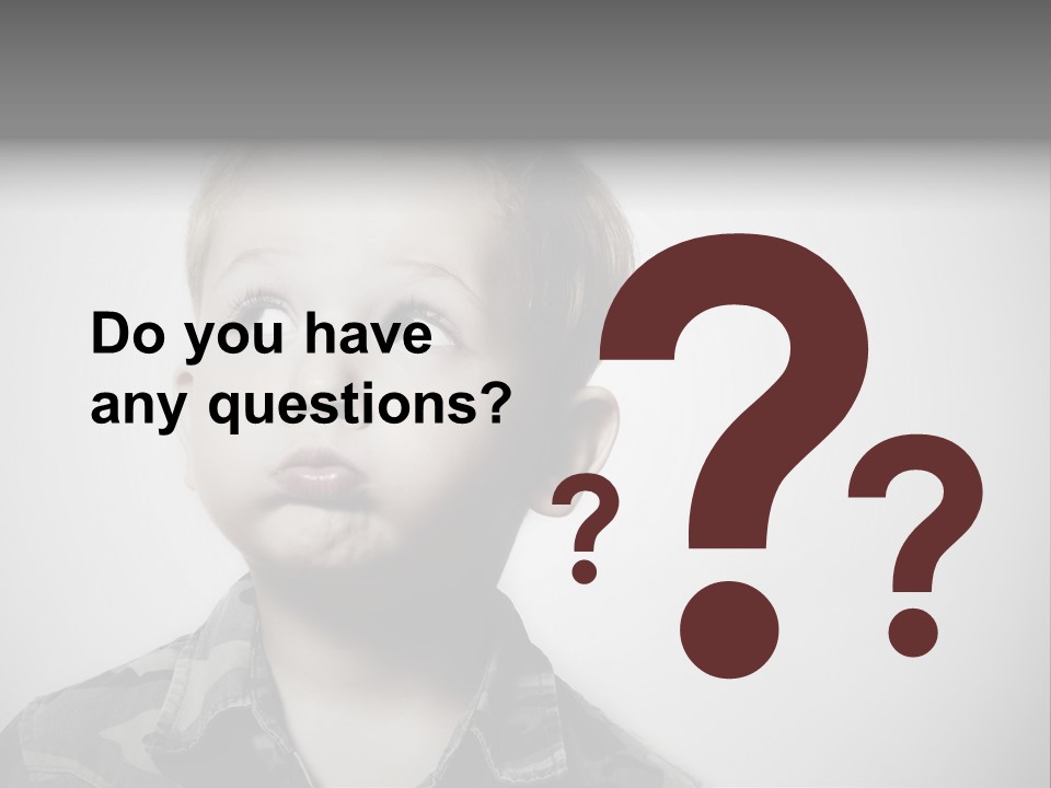 A Young Boy Is Making A Funny Face PowerPoint Template