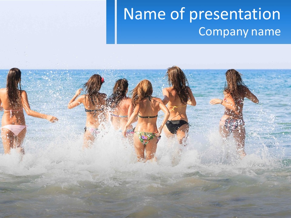 A Group Of Girls Splashing In The Ocean PowerPoint Template