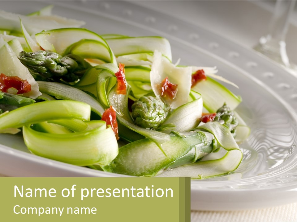 A White Plate Topped With Green Vegetables And Sauce PowerPoint Template