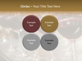 A Row Of Wine Glasses Filled With Red Wine PowerPoint Template