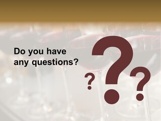 A Row Of Wine Glasses Filled With Red Wine PowerPoint Template
