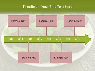 A Plate Of Food On A Wooden Table PowerPoint Template