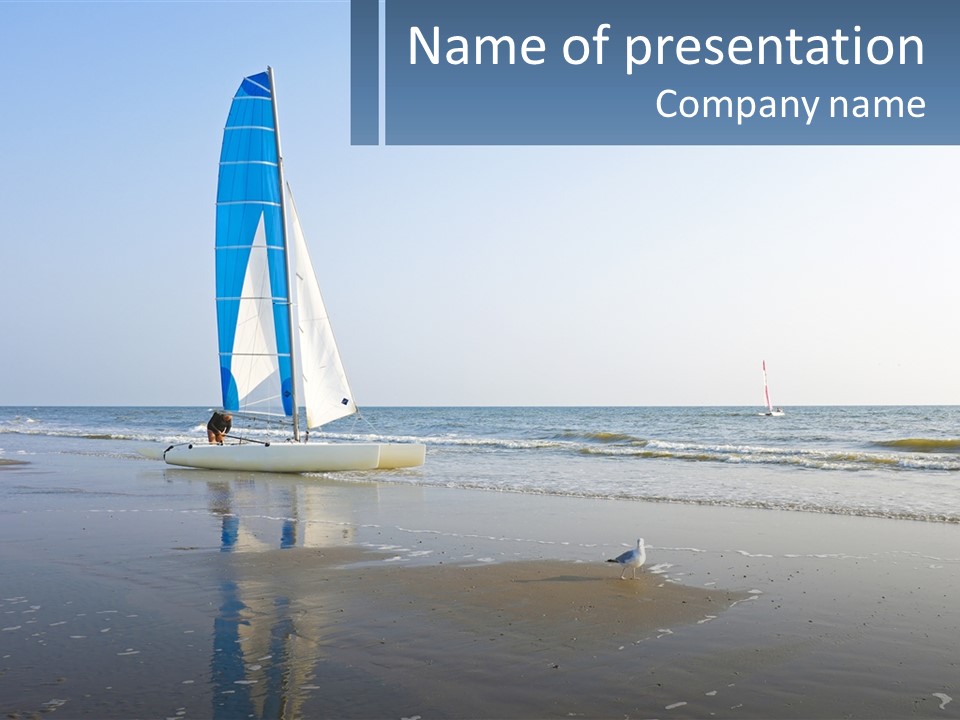 A Sailboat On The Beach With A Person On It PowerPoint Template