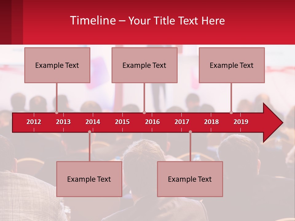 A Man Giving A Presentation To A Group Of People PowerPoint Template