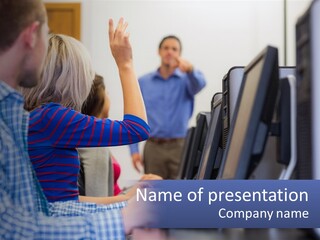 A Group Of People Standing Around A Computer Screen PowerPoint Template