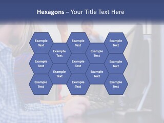 A Group Of People Standing Around A Computer Screen PowerPoint Template