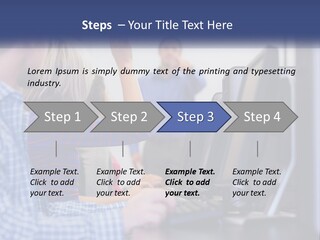 A Group Of People Standing Around A Computer Screen PowerPoint Template