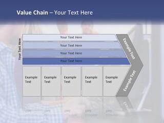 A Group Of People Standing Around A Computer Screen PowerPoint Template