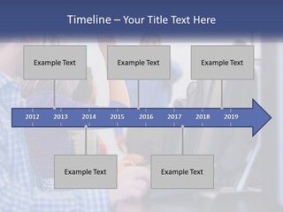A Group Of People Standing Around A Computer Screen PowerPoint Template
