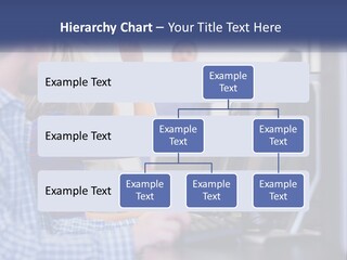 A Group Of People Standing Around A Computer Screen PowerPoint Template