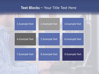 A Group Of People Standing Around A Computer Screen PowerPoint Template