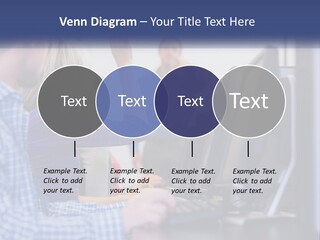 A Group Of People Standing Around A Computer Screen PowerPoint Template