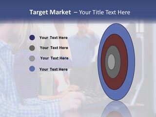 A Group Of People Standing Around A Computer Screen PowerPoint Template