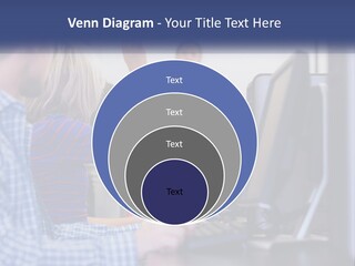 A Group Of People Standing Around A Computer Screen PowerPoint Template