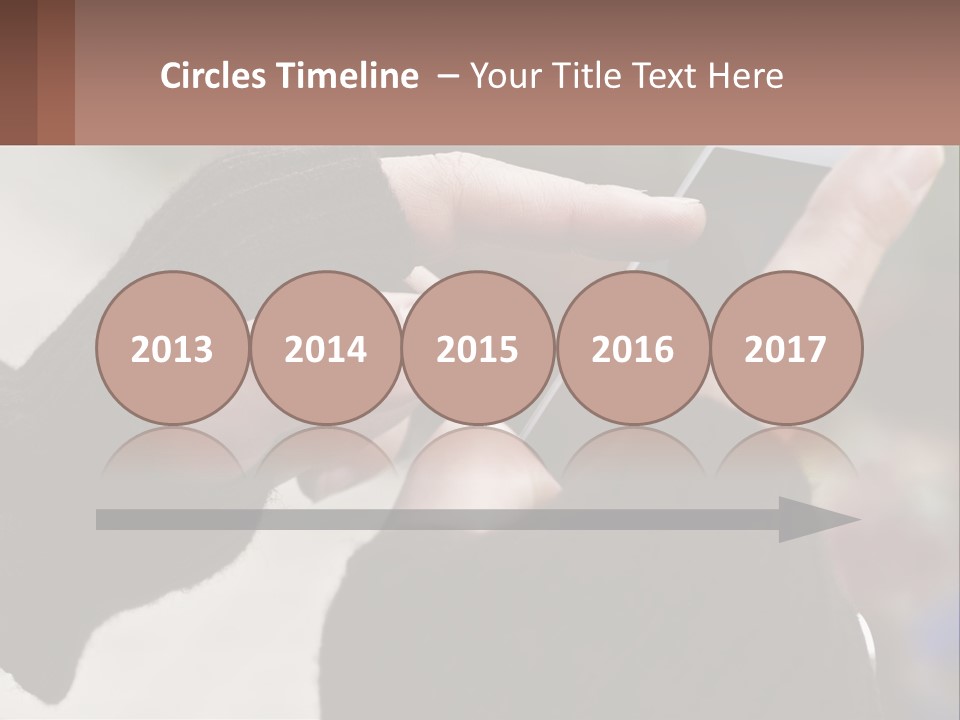 A Person Holding A Cell Phone In Their Hands PowerPoint Template