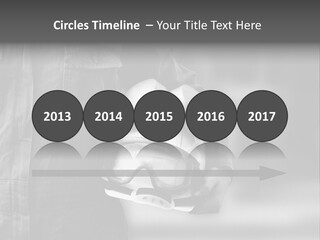 A Man Wearing A Helmet With Goggles On His Face PowerPoint Template