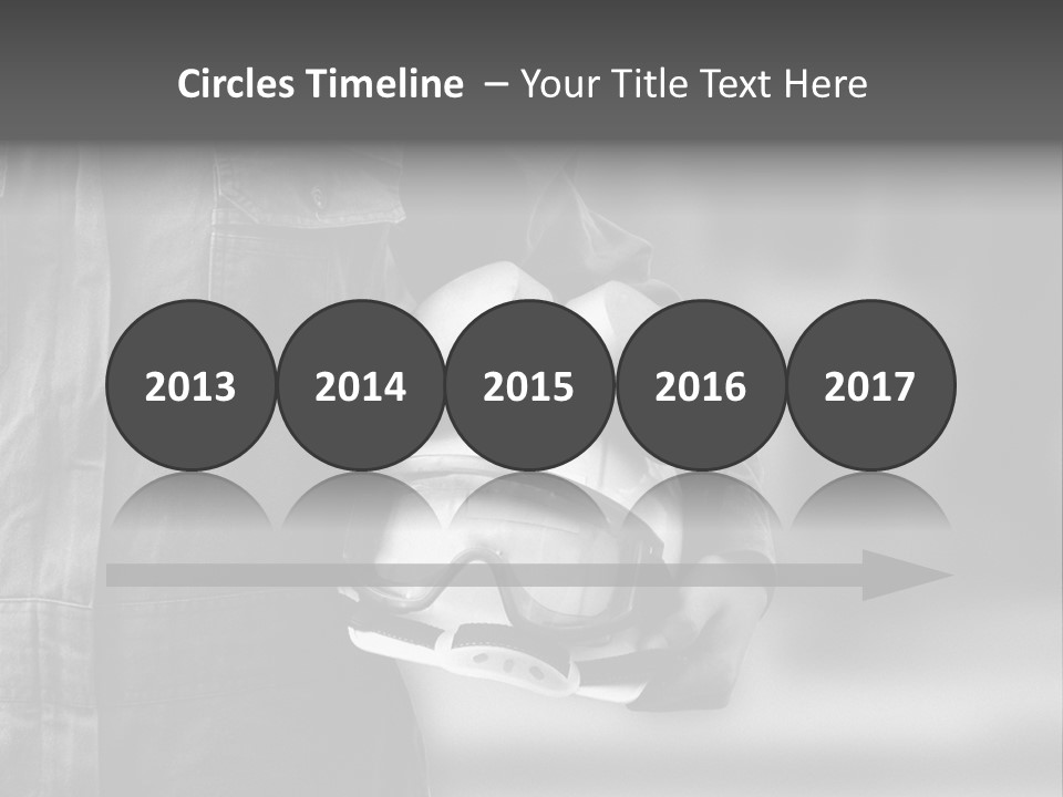 A Man Wearing A Helmet With Goggles On His Face PowerPoint Template