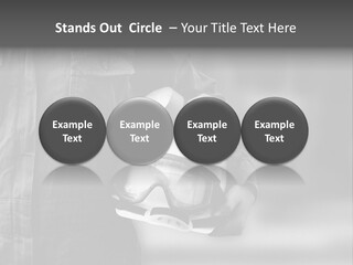 A Man Wearing A Helmet With Goggles On His Face PowerPoint Template