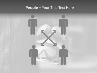 A Man Wearing A Helmet With Goggles On His Face PowerPoint Template