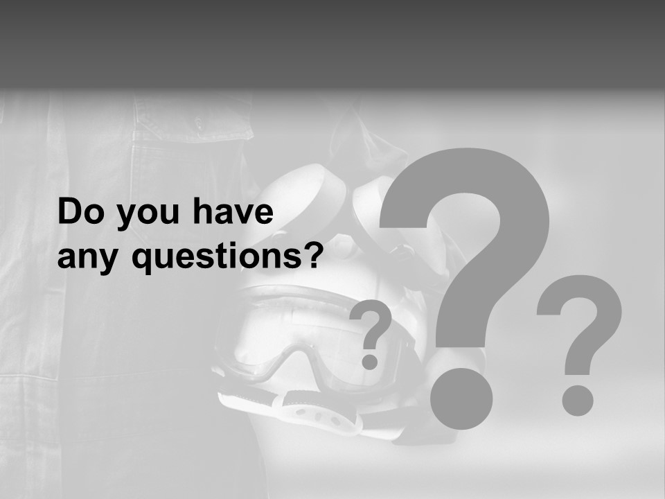 A Man Wearing A Helmet With Goggles On His Face PowerPoint Template