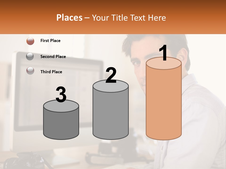 A Man Sitting At A Desk In Front Of A Computer PowerPoint Template