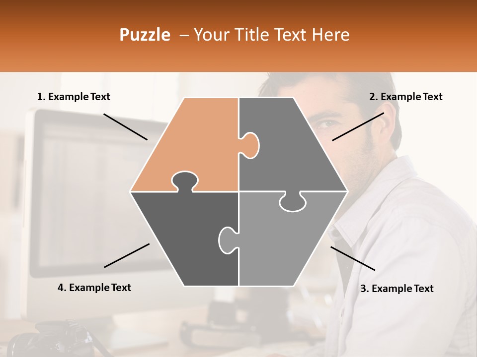 A Man Sitting At A Desk In Front Of A Computer PowerPoint Template