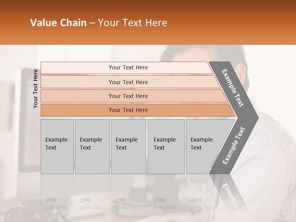 A Man Sitting At A Desk In Front Of A Computer PowerPoint Template