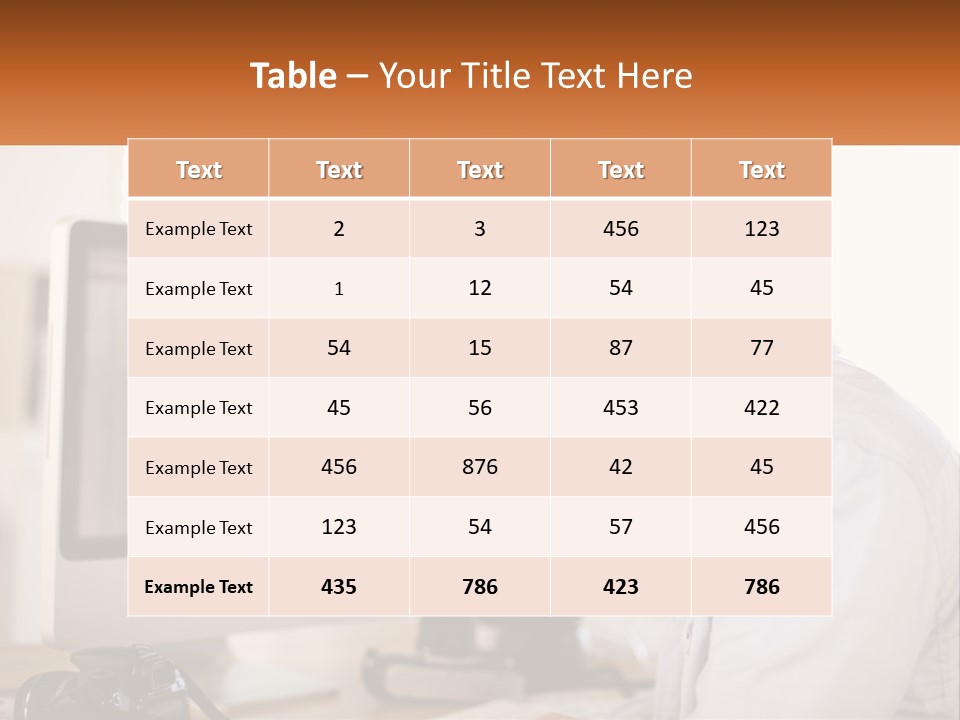 A Man Sitting At A Desk In Front Of A Computer PowerPoint Template