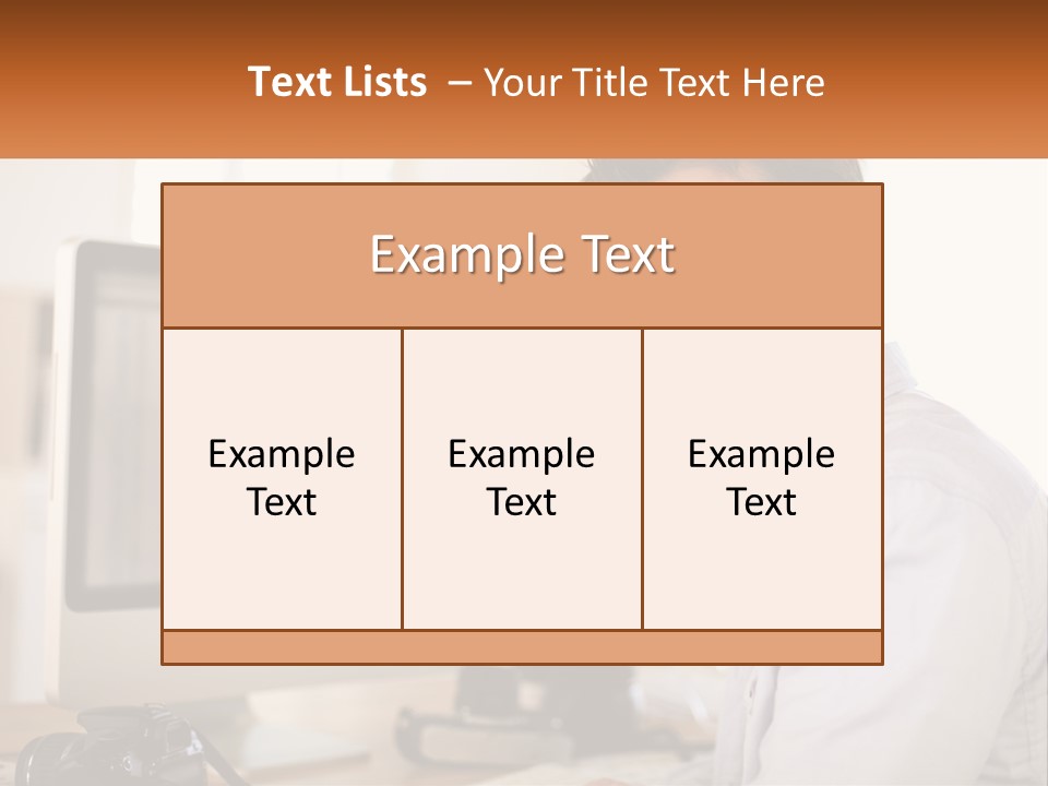 A Man Sitting At A Desk In Front Of A Computer PowerPoint Template