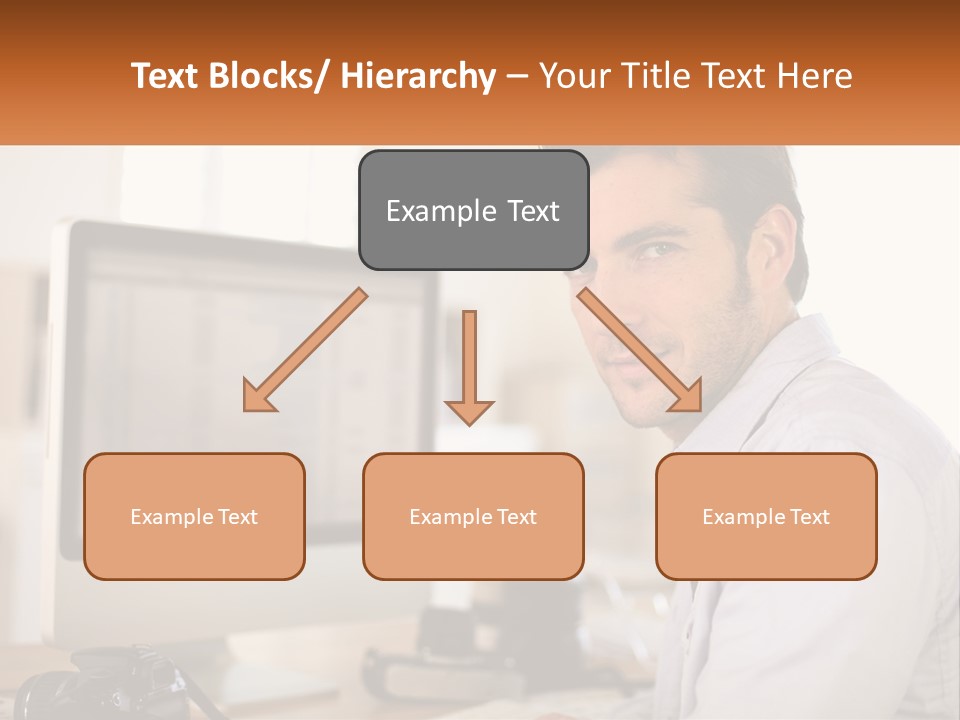 A Man Sitting At A Desk In Front Of A Computer PowerPoint Template