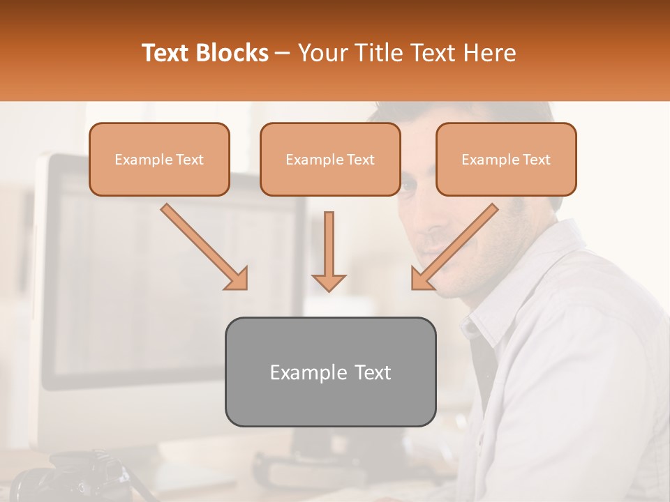 A Man Sitting At A Desk In Front Of A Computer PowerPoint Template