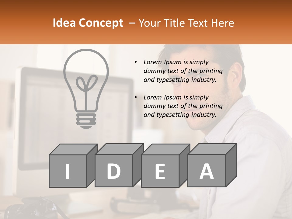 A Man Sitting At A Desk In Front Of A Computer PowerPoint Template