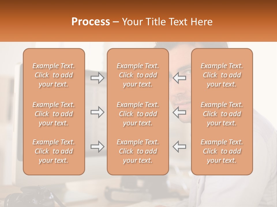 A Man Sitting At A Desk In Front Of A Computer PowerPoint Template