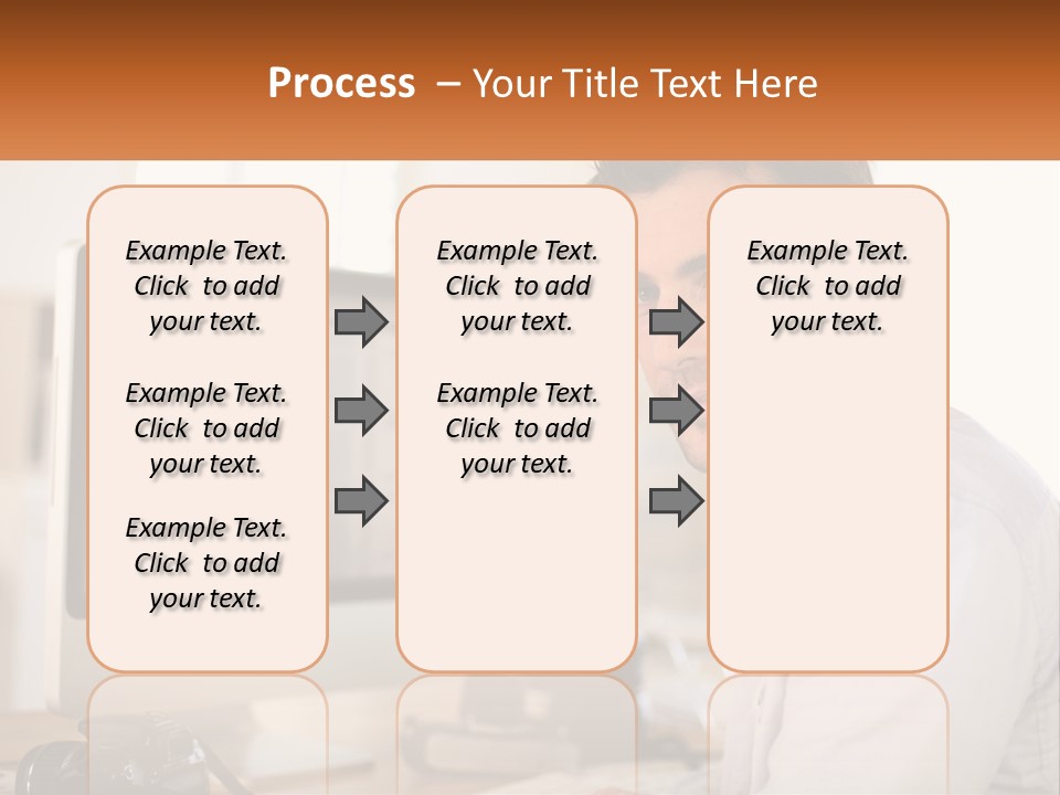 A Man Sitting At A Desk In Front Of A Computer PowerPoint Template
