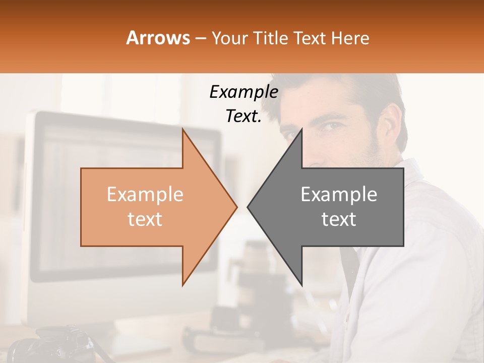 A Man Sitting At A Desk In Front Of A Computer PowerPoint Template