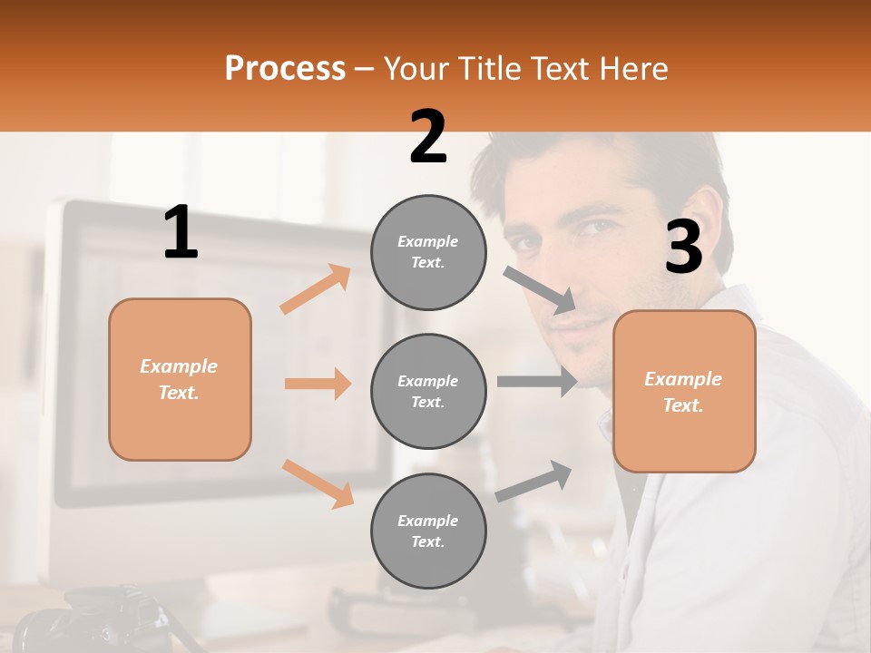 A Man Sitting At A Desk In Front Of A Computer PowerPoint Template