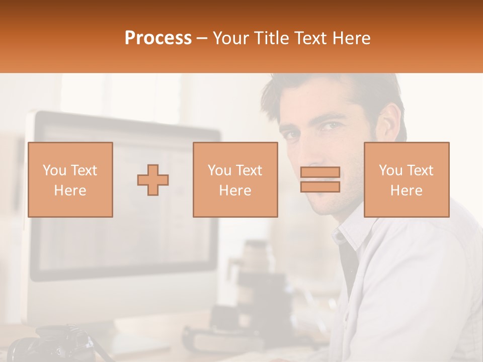 A Man Sitting At A Desk In Front Of A Computer PowerPoint Template