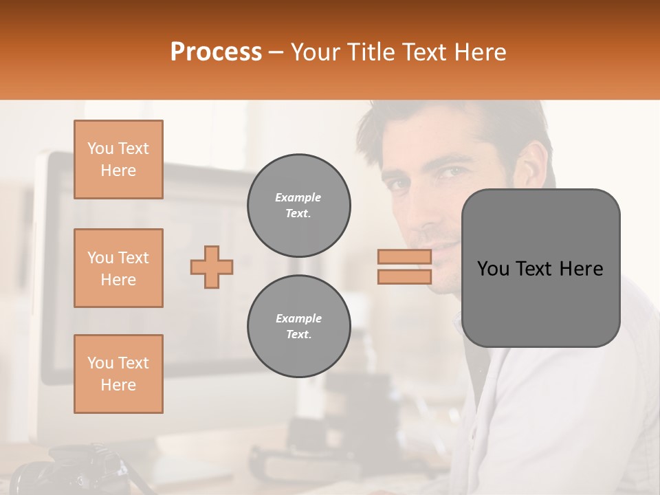 A Man Sitting At A Desk In Front Of A Computer PowerPoint Template